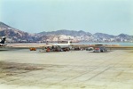 Passengers boarding a Lufthansa jet at Kai Tak Airport with Kwun Tong beyond, Photographer: Juergen Niemann