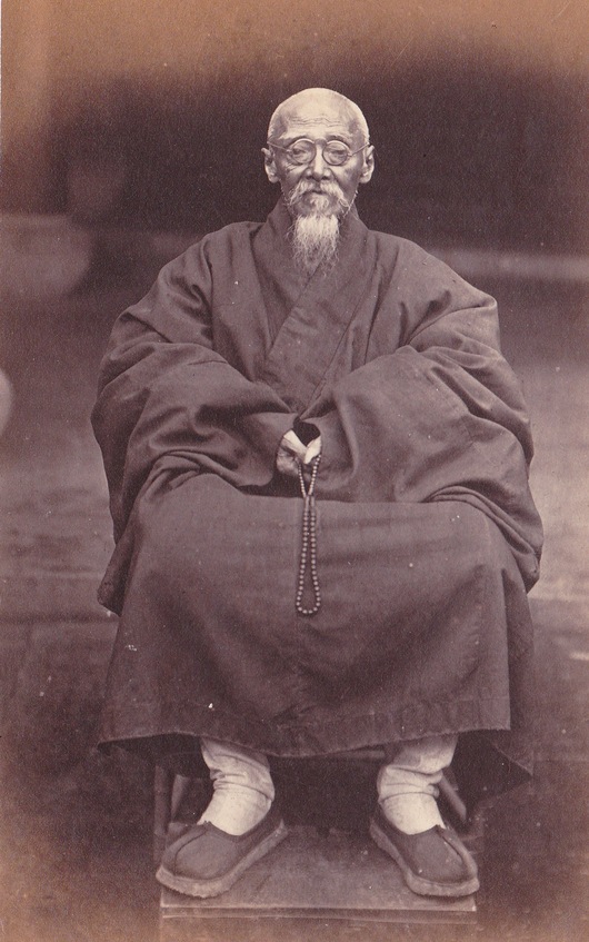 Chinese Monk with Prayer Beads