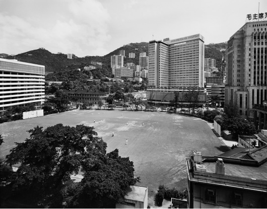 Hong Kong Cricket Club with Hilton Hotel in the background
